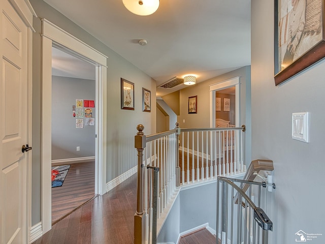 469 Corinth Cir, Dundee, MI 48131 - hall with an upstairs landing, wood finished floors, and baseboards