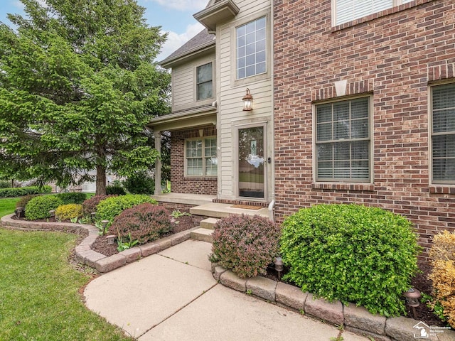 469 Corinth Cir, Dundee, MI 48131 - view of exterior entry featuring brick siding