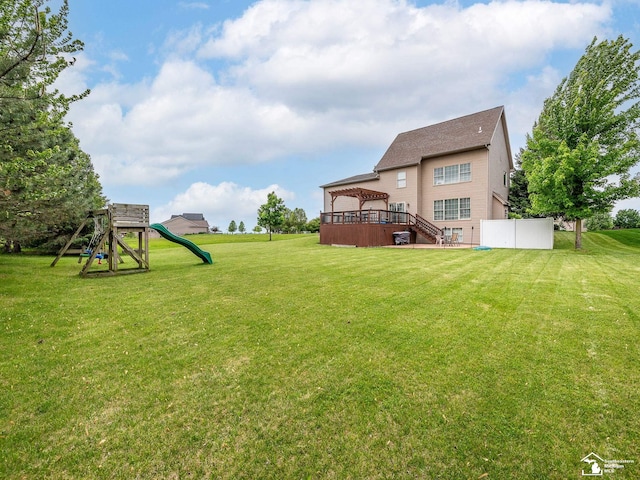 469 Corinth Cir, Dundee, MI 48131 - view of yard with a playground, stairs, and a wooden deck
