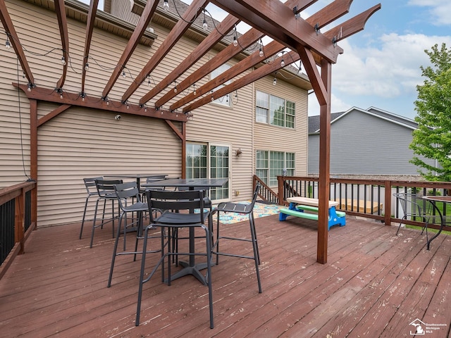 469 Corinth Cir, Dundee, MI 48131 - wooden terrace with a pergola and outdoor dining space