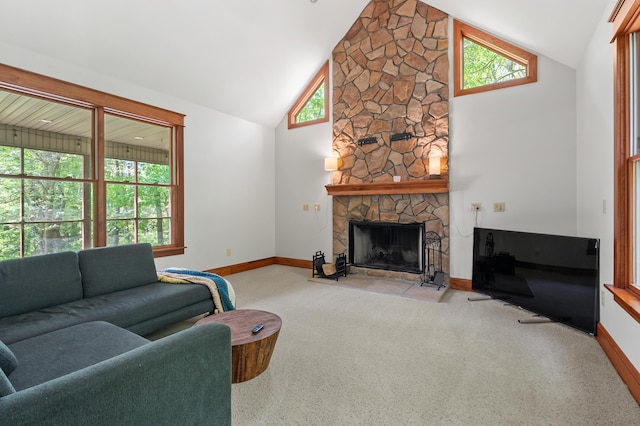 9934 W Fg Ave, Kalamazoo, MI 49009 - living area with baseboards, carpet, healthy amount of natural light, a fireplace, and high vaulted ceiling