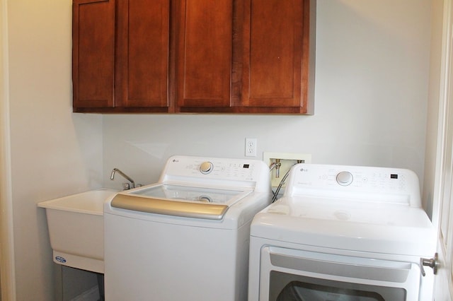 45862 S Stonewood Rd Unit 218, Canton, MI 48187 - washroom with washer and clothes dryer and cabinet space