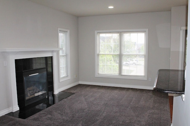 45862 S Stonewood Rd Unit 218, Canton, MI 48187 - unfurnished living room with a fireplace, baseboards, dark colored carpet, and recessed lighting