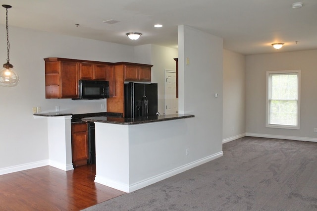 45862 S Stonewood Rd Unit 218, Canton, MI 48187 - kitchen featuring black appliances, brown cabinetry, pendant lighting, and open shelves