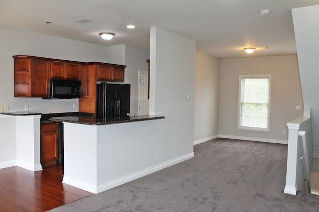 45862 S Stonewood Rd Unit 218, Canton, MI 48187 - kitchen featuring black appliances, open shelves, baseboards, dark colored carpet, and a peninsula