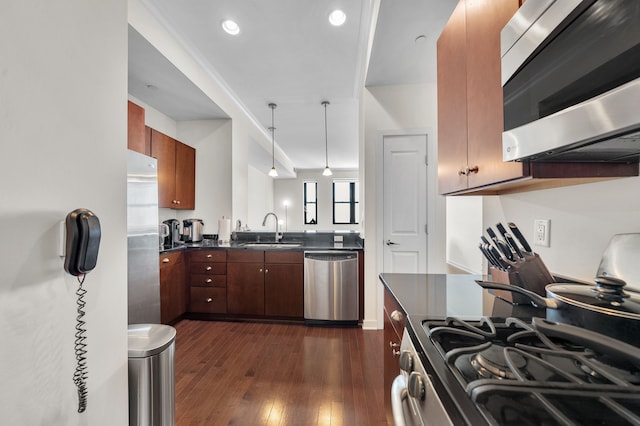 1135 Shelby St Unit 59-2808, Detroit, MI 48226 - kitchen featuring appliances with stainless steel finishes, ventilation hood, dark wood-style flooring, a sink, and dark countertops