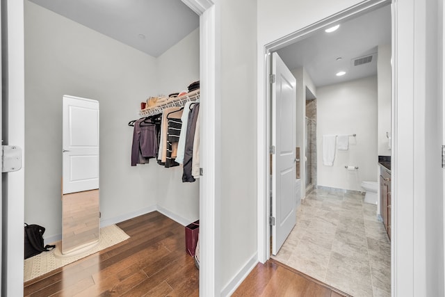 1135 Shelby St Unit 59-2808, Detroit, MI 48226 - spacious closet with wood finished floors