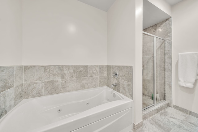 1135 Shelby St Unit 59-2808, Detroit, MI 48226 - full bath with a shower stall, a whirlpool tub, and marble finish floors