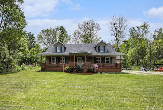 6621 Dove Rd, Kimball, MI 48074 - view of front of property with a porch, a front lawn, and a shingled roof