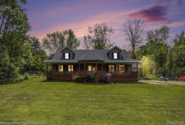 6621 Dove Rd, Kimball, MI 48074 - view of front facade featuring covered porch, a yard, and a shingled roof
