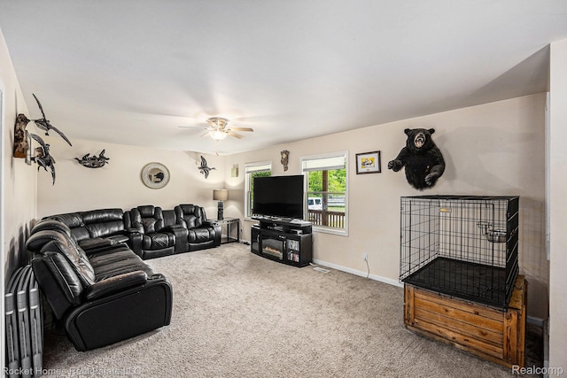 6621 Dove Rd, Kimball, MI 48074 - carpeted living area with a ceiling fan and baseboards
