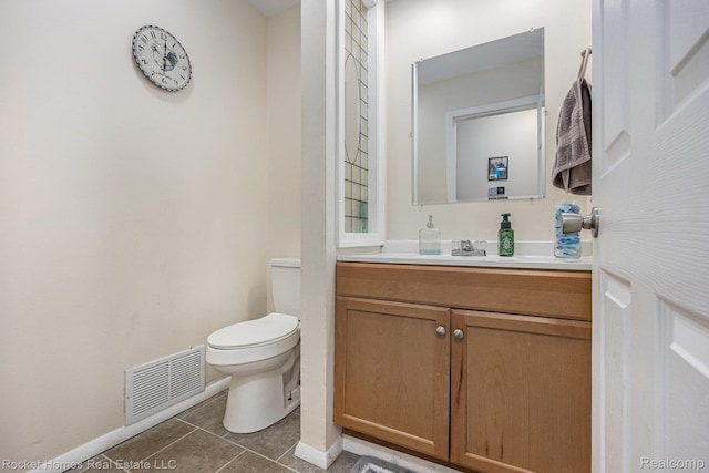 6621 Dove Rd, Kimball, MI 48074 - half bathroom with toilet, vanity, tile patterned floors, and baseboards