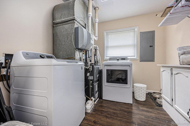 6621 Dove Rd, Kimball, MI 48074 - laundry area with electric panel, washing machine and dryer, and dark wood-style flooring
