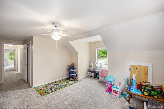 6621 Dove Rd, Kimball, MI 48074 - recreation room with carpet flooring, a ceiling fan, baseboards, and lofted ceiling