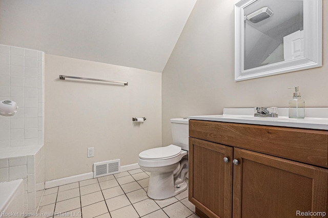6621 Dove Rd, Kimball, MI 48074 - full bath featuring vanity, lofted ceiling, tile patterned floors, toilet, and baseboards
