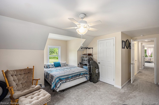 6621 Dove Rd, Kimball, MI 48074 - bedroom with light carpet, baseboards, lofted ceiling, and ceiling fan
