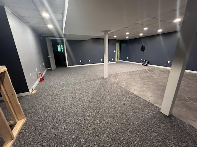 72 E Brink St, Grant, MI 49327 - finished basement with baseboards, tile patterned flooring, recessed lighting, carpet floors, and a paneled ceiling