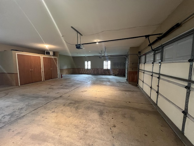 72 E Brink St, Grant, MI 49327 - garage featuring a garage door opener