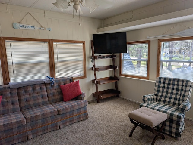 5268 S Arrowhead Trl, Baldwin, MI 49304 - living area featuring carpet floors and a ceiling fan