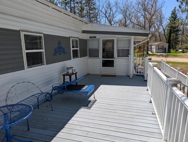 5268 S Arrowhead Trl, Baldwin, MI 49304 - view of wooden terrace