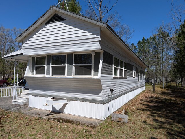 5268 S Arrowhead Trl, Baldwin, MI 49304 - view of side of home
