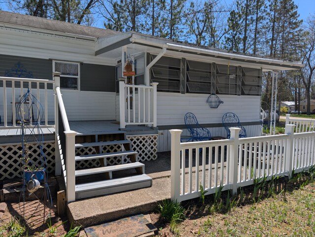 5268 S Arrowhead Trl, Baldwin, MI 49304 - view of wooden deck