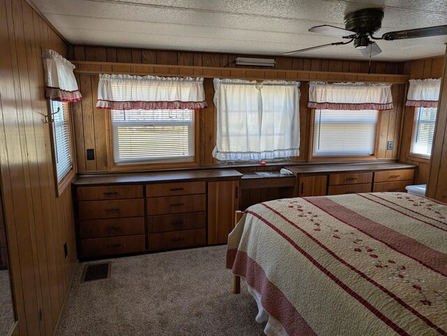 5268 S Arrowhead Trl, Baldwin, MI 49304 - carpeted bedroom featuring wooden walls