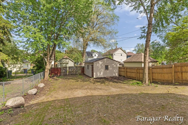 964 Lincoln Ave NW, Grand Rapids, MI 49504 - fenced backyard with an outdoor structure and a storage shed