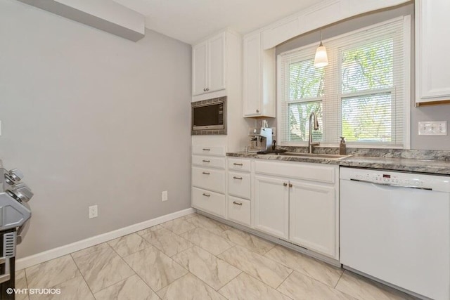 2553 Bristol Ter, Saint Joseph, MI 49085 - kitchen with dishwasher, a sink, white cabinetry, light marble finish floors, and stainless steel microwave