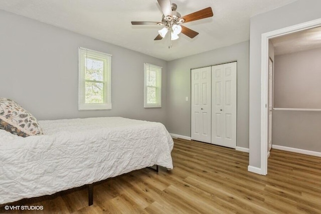 2553 Bristol Ter, Saint Joseph, MI 49085 - bedroom featuring wood finished floors, baseboards, and a closet