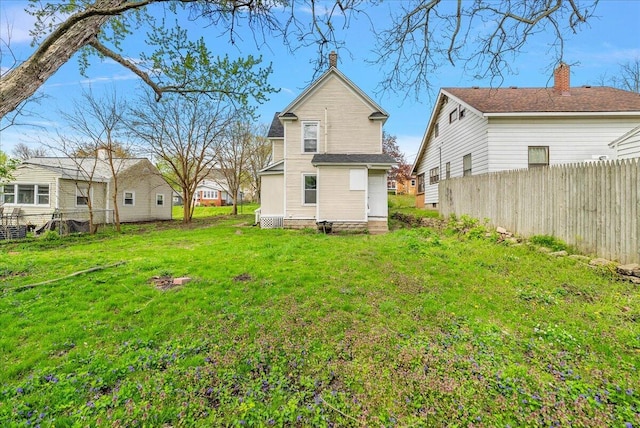 470 Houseman Ave NE, Grand Rapids, MI 49503 - back of property with a chimney