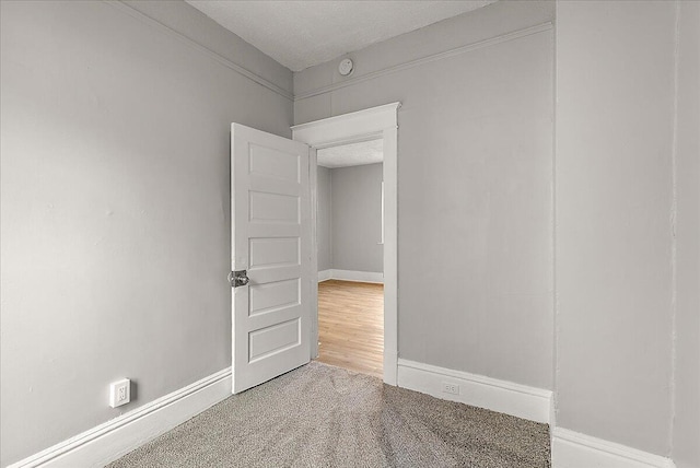 470 Houseman Ave NE, Grand Rapids, MI 49503 - carpeted empty room with baseboards and a smoke detector