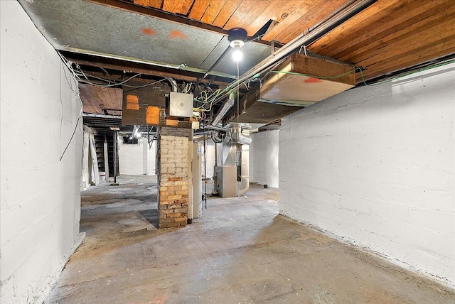 470 Houseman Ave NE, Grand Rapids, MI 49503 - unfinished basement featuring heating unit and water heater