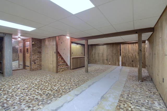 33951 Old Timber Rd, Farmington Hills, MI 48331 - finished below grade area with wooden walls, stairs, and a drop ceiling
