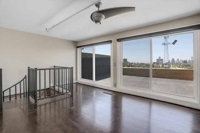 6533 E Jefferson Ave Unit 413W, Detroit, MI 48207 - unfurnished room with wood finished floors and a view of city