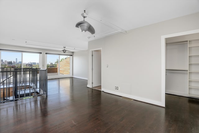 6533 E Jefferson Ave Unit 413W, Detroit, MI 48207 - empty room with wood finished floors and baseboards