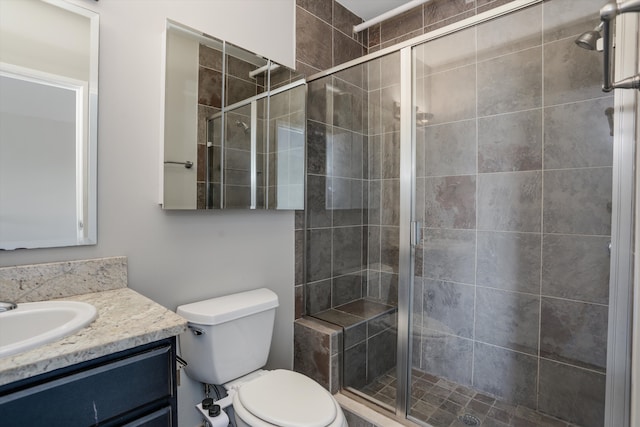 6533 E Jefferson Ave Unit 413W, Detroit, MI 48207 - full bathroom with a stall shower, vanity, and toilet