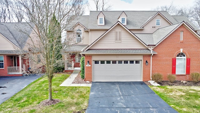 6927 Stonewood Pl, Clarkston, MI 48346 - traditional-style home with asphalt driveway, brick siding, a shingled roof, and a front lawn