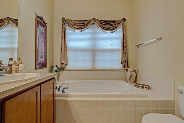 6927 Stonewood Pl, Clarkston, MI 48346 - full bathroom with a garden tub, vanity, and toilet