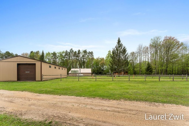 1442 W Tyler Rd, Hart, MI 49420 - view of yard with a garage, a pole building, an outdoor structure, and driveway