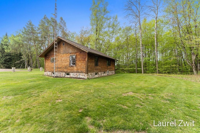 1442 W Tyler Rd, Hart, MI 49420 - view of side of home featuring a yard