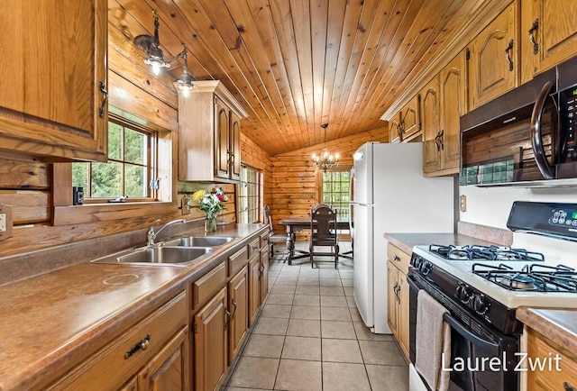 1442 W Tyler Rd, Hart, MI 49420 - kitchen with gas stove, a sink, healthy amount of natural light, wood ceiling, and a chandelier