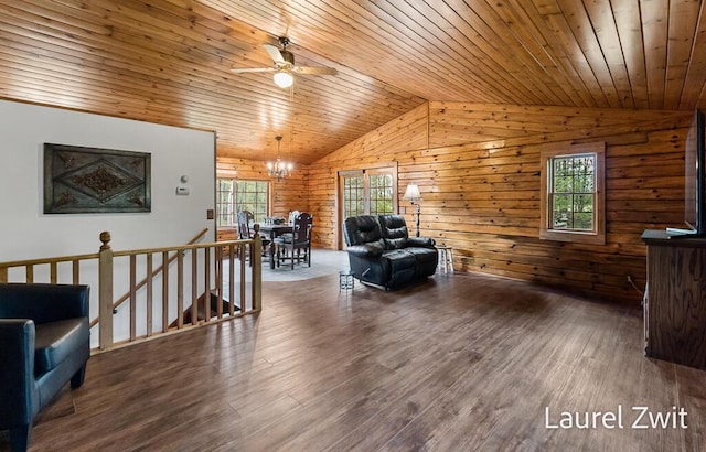 1442 W Tyler Rd, Hart, MI 49420 - living room featuring lofted ceiling, wooden ceiling, plenty of natural light, a ceiling fan, and a chandelier
