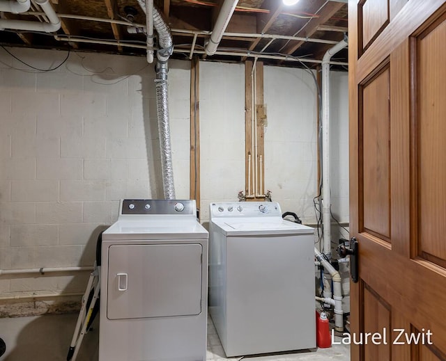 1442 W Tyler Rd, Hart, MI 49420 - laundry room featuring washing machine and dryer
