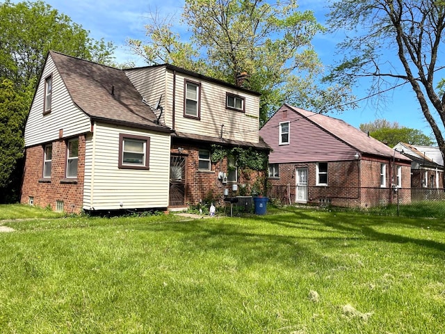 19400 Greydale Ave, Detroit, MI 48219 - rear view of property with brick siding, a chimney, and roof with shingles