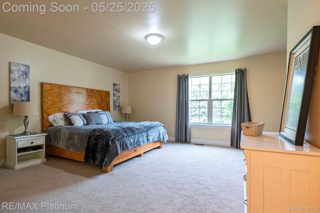 2038 Pine Bluffs Ct, Highland, MI 48357 - bedroom with light colored carpet and baseboards