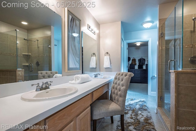 2038 Pine Bluffs Ct, Highland, MI 48357 - bathroom with double vanity, a shower stall, and tile patterned flooring
