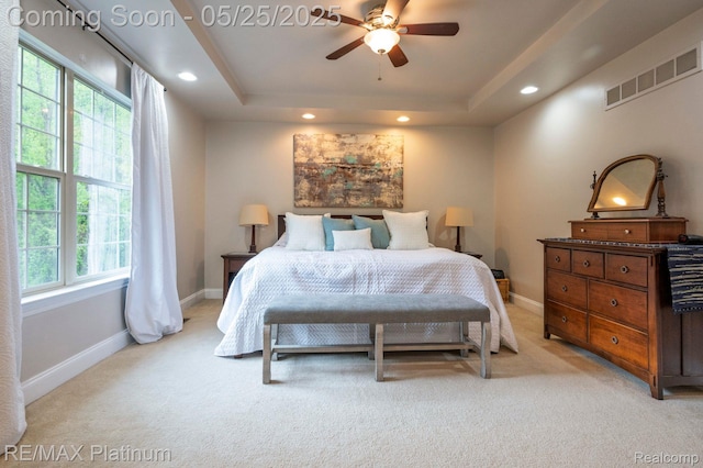 2038 Pine Bluffs Ct, Highland, MI 48357 - bedroom featuring light carpet, a tray ceiling, recessed lighting, baseboards, and a ceiling fan