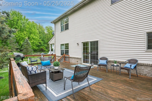 2038 Pine Bluffs Ct, Highland, MI 48357 - wooden deck with an outdoor living space