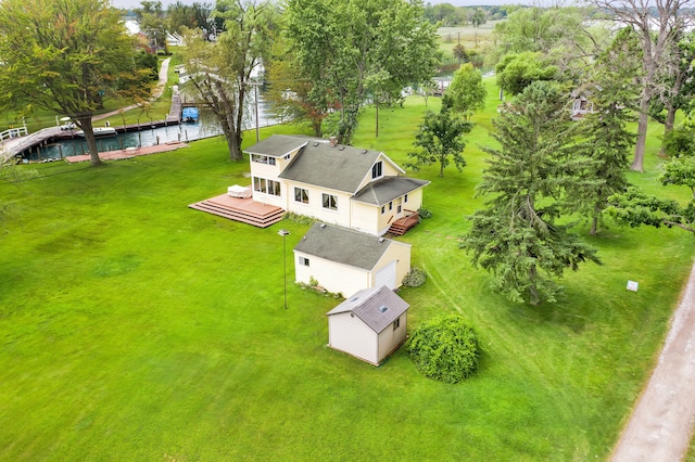view of subject property with a nearby body of water